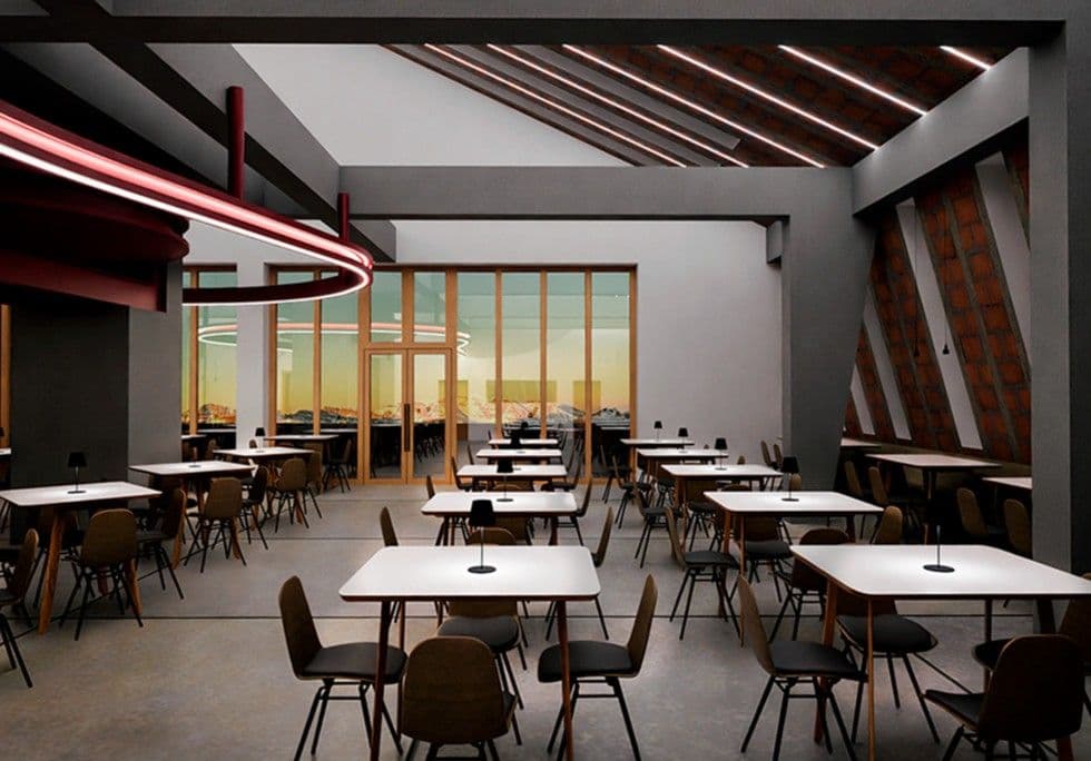 Rifugio Zeno Colò: interni del ristorante con struttura lignea a vista e luci lineari
